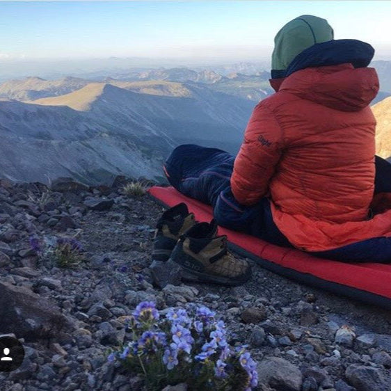 RMI guide on Rainier with Whittaker Mountaineering rental gear